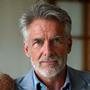 David L. Round Rock, TX, a man in his 50s, looking thoughtful, in a testimonial photo.